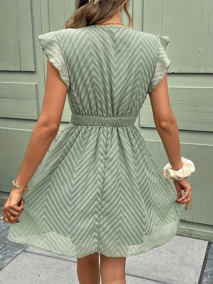 Ärmelloses Nayora Kleid mit V-Ausschnitt